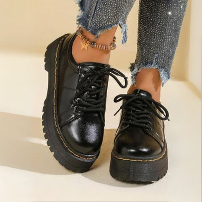 ZAPATOS CON CORDONES Y SUELA DE CUERO DE MUJER